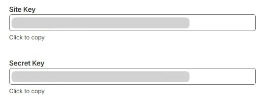 Site KeyとSecret Keyの2つの入力欄が表示され、それぞれClick to copyのテキストが下部に配置されている